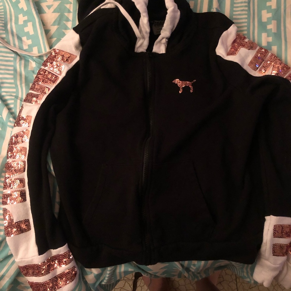 A pink jacket with rose gold Detailings